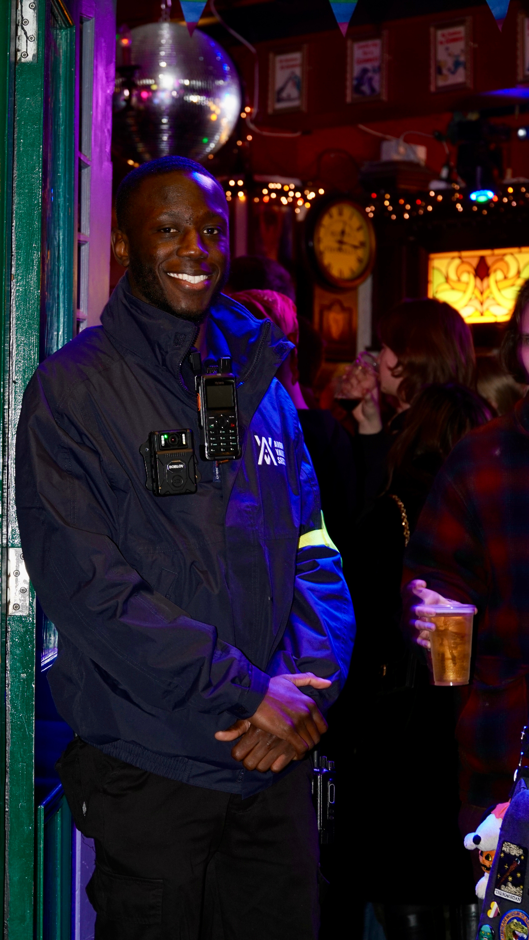 Door supervisor in Avon Valley Security uniform outside a Bristol bar